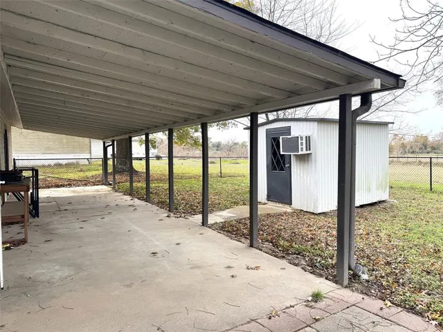 a view of a backyard of a house