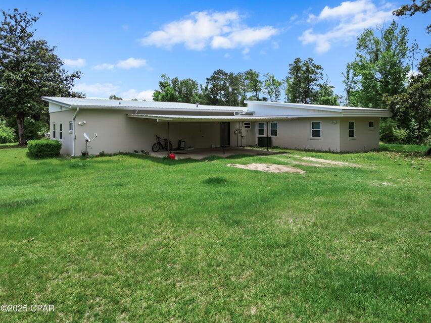 133 Devane Road Chattahoochee, FL 32324 - Photo 12 of 39 a view of a backyard