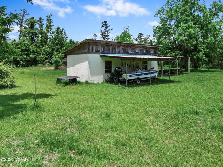 133 Devane Road Chattahoochee, FL 32324 - Photo 13 of 39 a view of a house with backyard