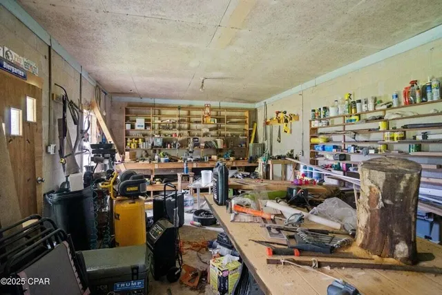a view of hallway with wooden floor