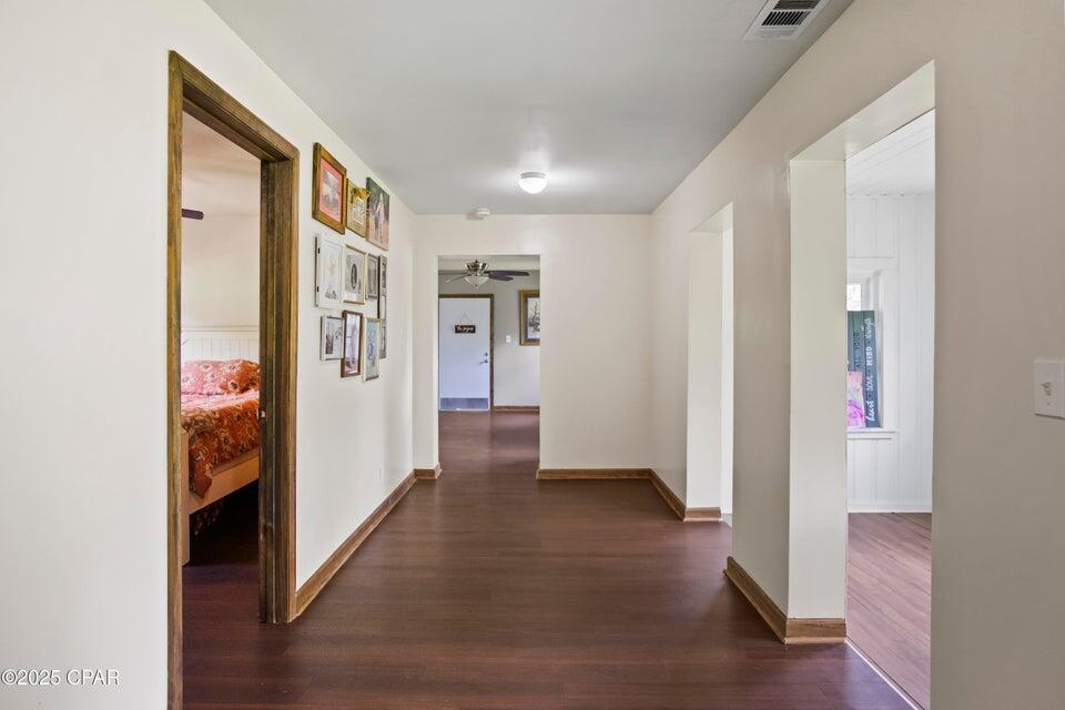 133 Devane Road Chattahoochee, FL 32324 - Photo 19 of 39 a view of hallway with wooden floor