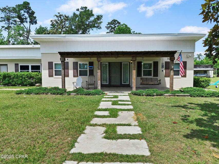 133 Devane Road Chattahoochee, FL 32324 - Photo 6 of 39 a front view of a house with a yard