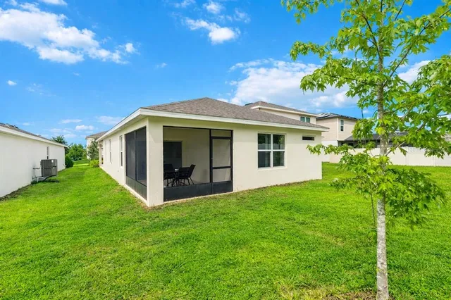 a view of front of house with a yard