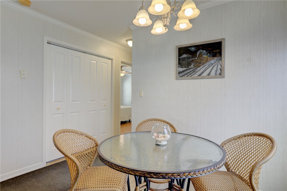 9755 61st Terrace Sebastian, FL 32958 - Photo 18 of 35 a view of a dining room with furniture