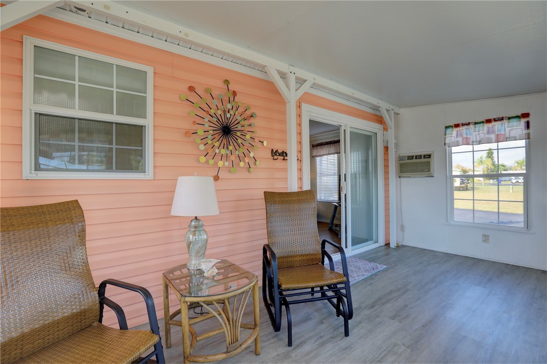 9755 61st Terrace Sebastian, FL 32958 - Photo 28 of 35 a view of a livingroom with furniture and window