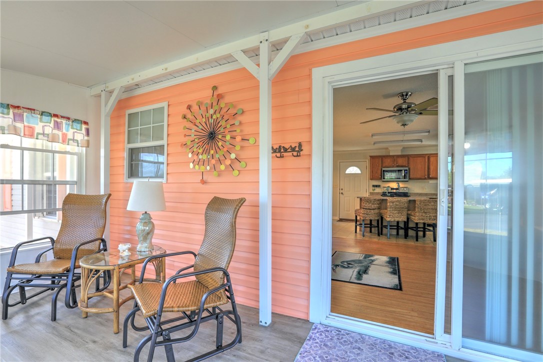 9755 61st Terrace Sebastian, FL 32958 - Photo 30 of 35 a dining room with furniture and window