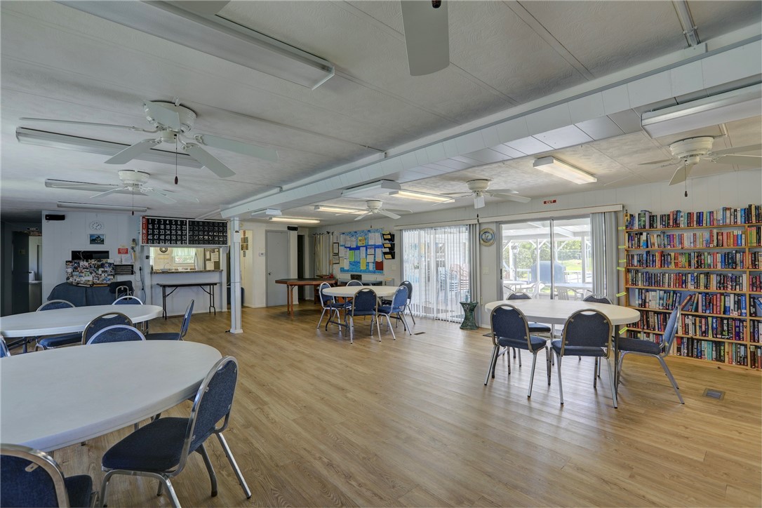 9755 61st Terrace Sebastian, FL 32958 - Photo 34 of 35 a view of a livingroom with furniture window and wooden floor