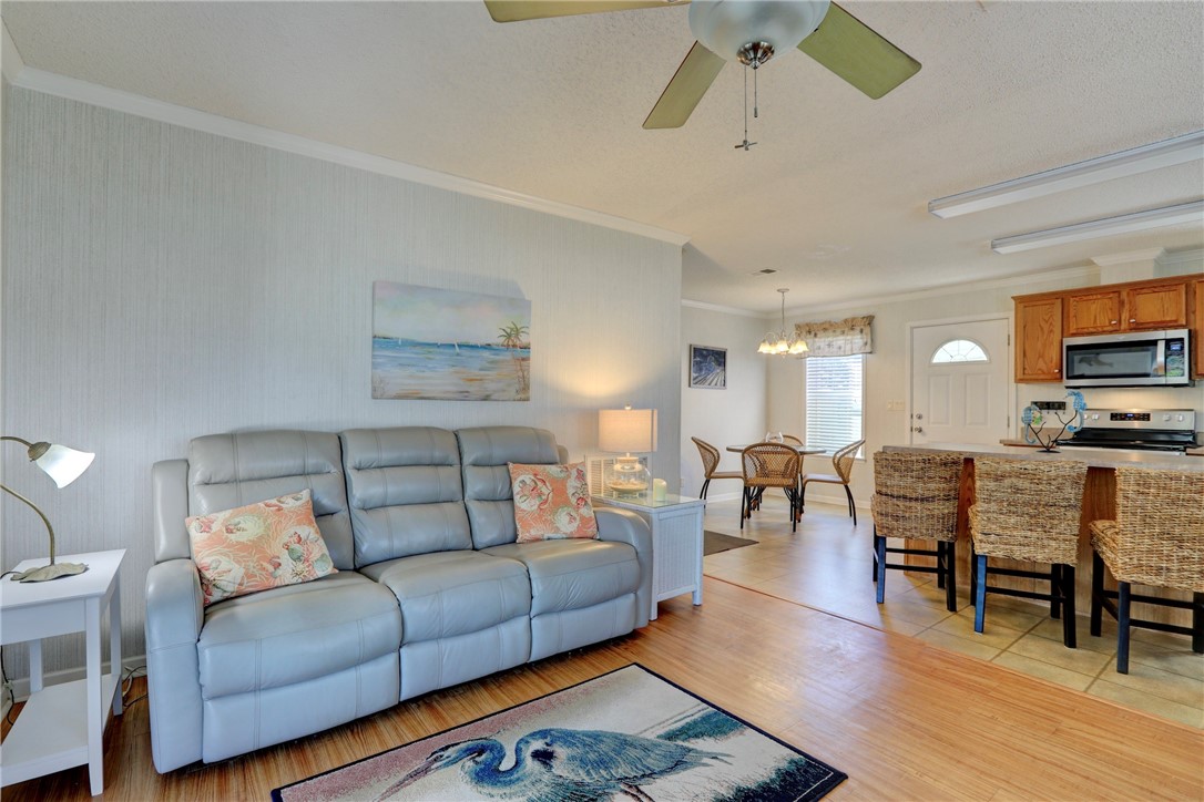 9755 61st Terrace Sebastian, FL 32958 - Photo 8 of 35 a living room with furniture fireplace and wooden floor