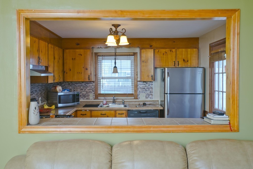 14 French Street Springfield, MA 01104 - Photo 11 of 29 a kitchen with a refrigerator and countertop