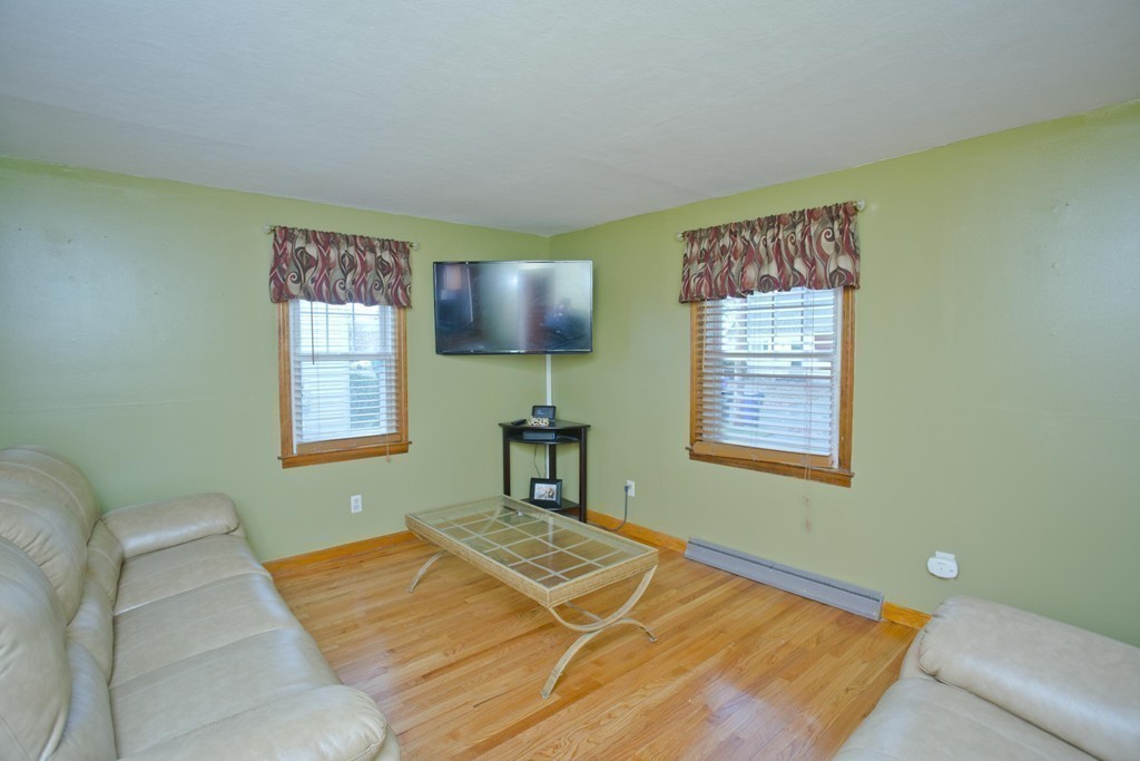 14 French Street Springfield, MA 01104 - Photo 12 of 29 a bedroom with a bed and a window