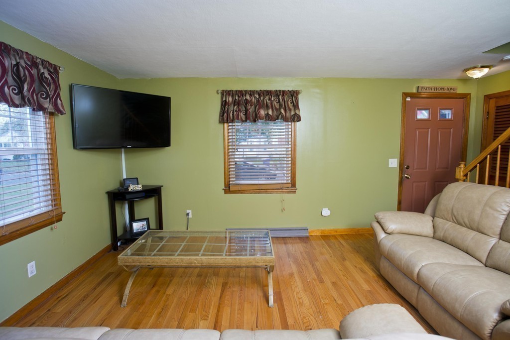14 French Street Springfield, MA 01104 - Photo 13 of 29 a living room with furniture and a flat screen tv