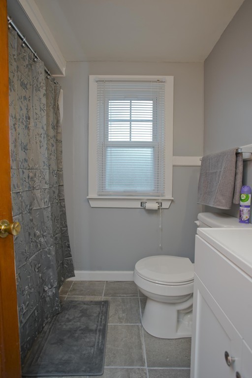 14 French Street Springfield, MA 01104 - Photo 20 of 29 a bathroom with a toilet and a shower