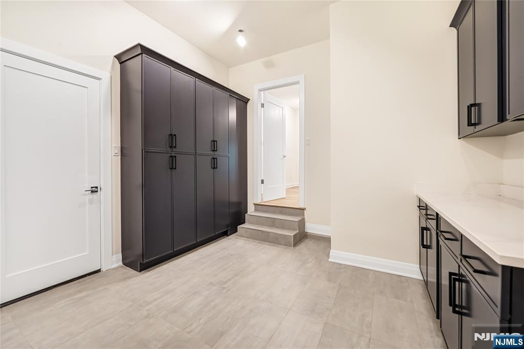 10 Big Ramapo Road Saddle River, NJ 07458 - Photo 24 of 44 a view of a hallway with closet area