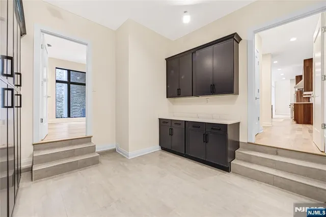 a view of a house with a yard and plants