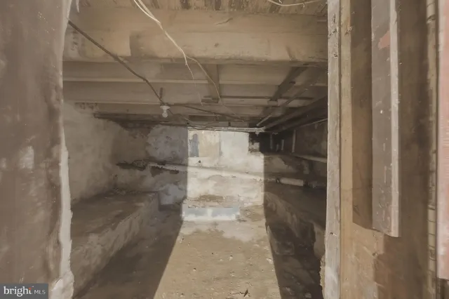 a view of a room with wooden walls