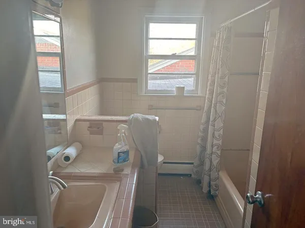 a bathroom with a sink and a toilet