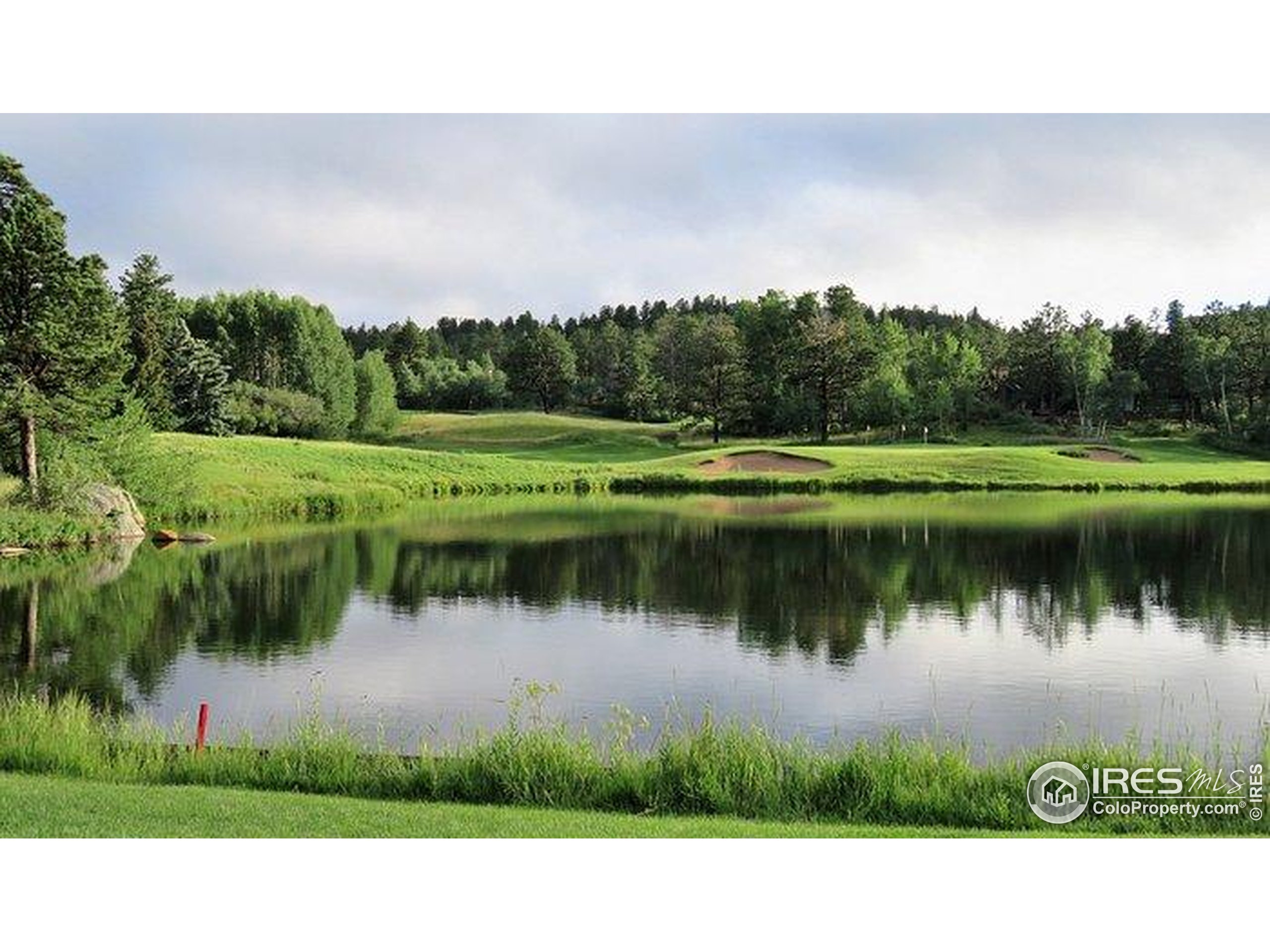 3 Fox Meadow Lane, Unit LOT 3 Red Feather Lakes, CO 80545 - Photo 23 of 25 a view of a lake in middle of forest