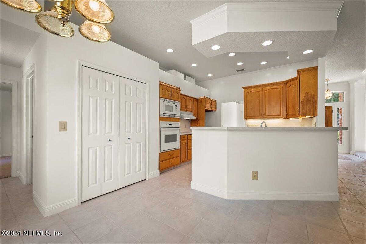 10967 Heathfield Road Jacksonville, FL 32225 - Photo 15 of 39 a view of kitchen with wooden floor