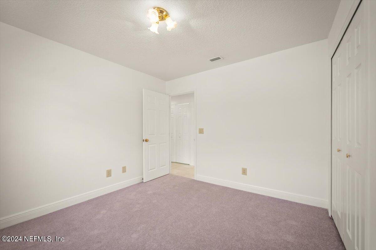 10967 Heathfield Road Jacksonville, FL 32225 - Photo 26 of 39 a view of an empty room