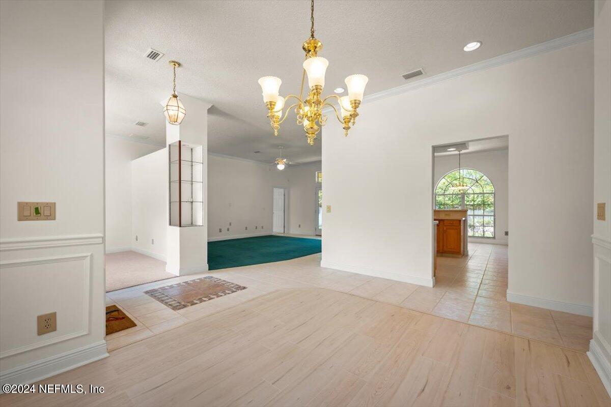 10967 Heathfield Road Jacksonville, FL 32225 - Photo 9 of 39 a view of a hallway view with staircase