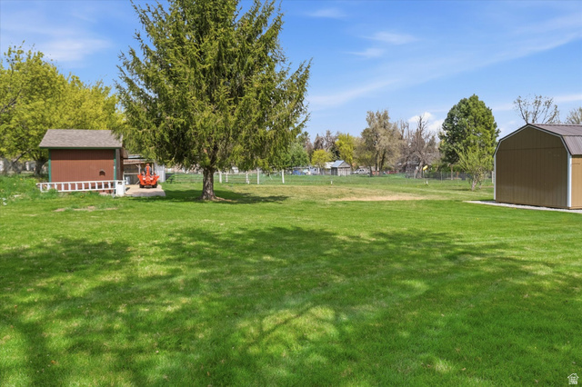 45 West 100 South Mendon, UT 84325 - Photo 45 of 64 View of yard featuring a shed