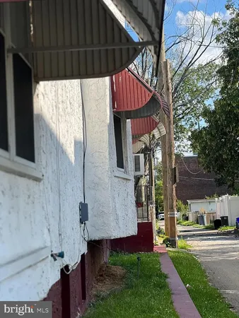 a view of a back yard of the house