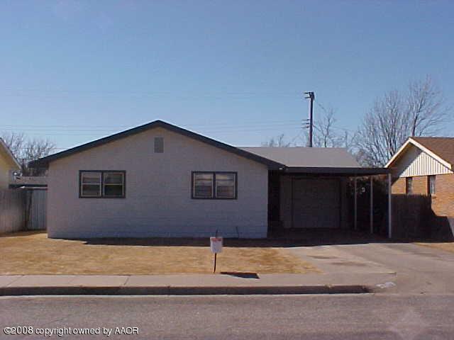 4702 South Fannin Street Amarillo, TX 79110 - Photo 1 of 10 a house that has a window in front of it