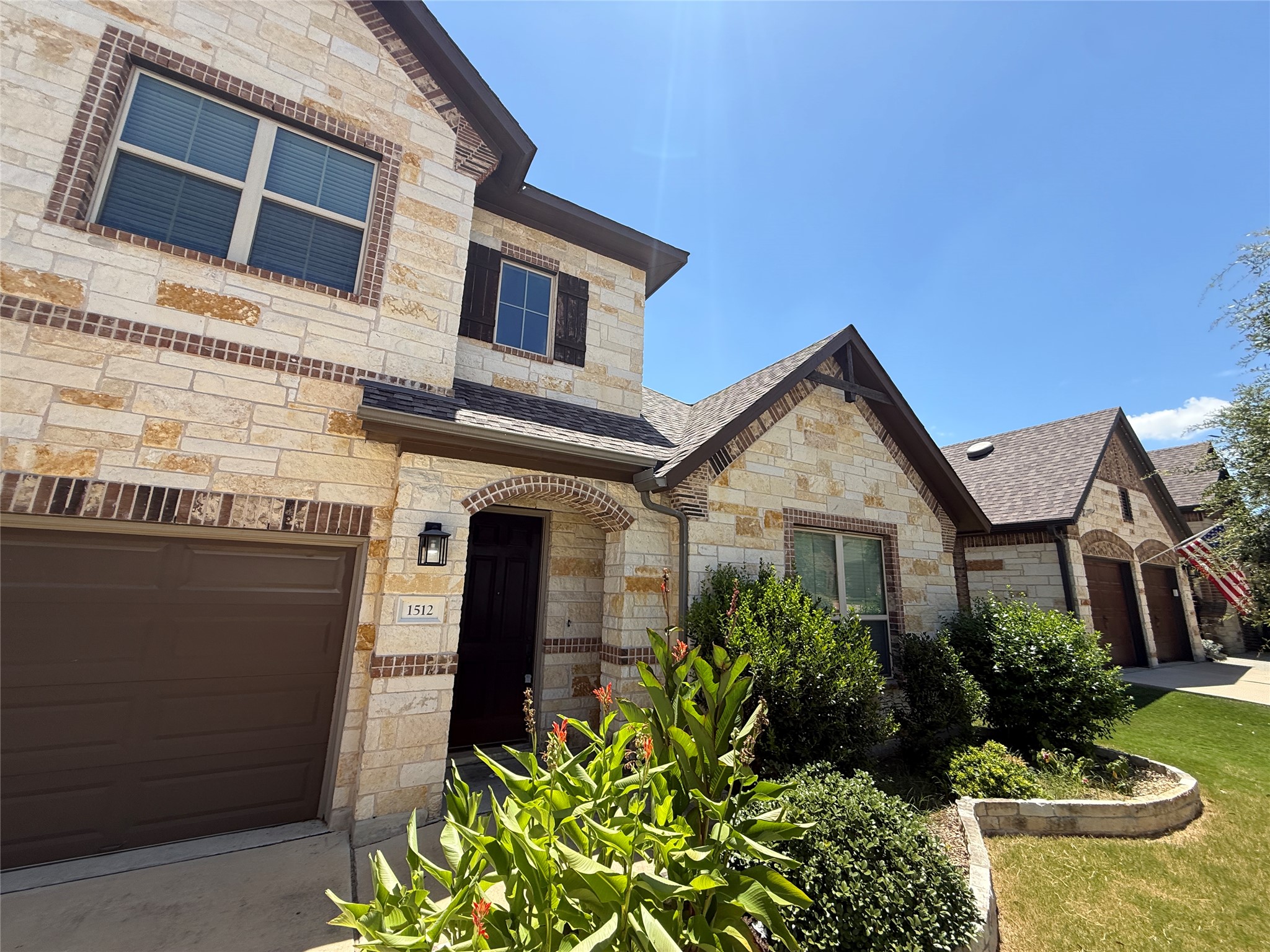 1512 Long Shadow Lane Georgetown, TX 78628 - Photo 2 of 19 a front view of a house with garden