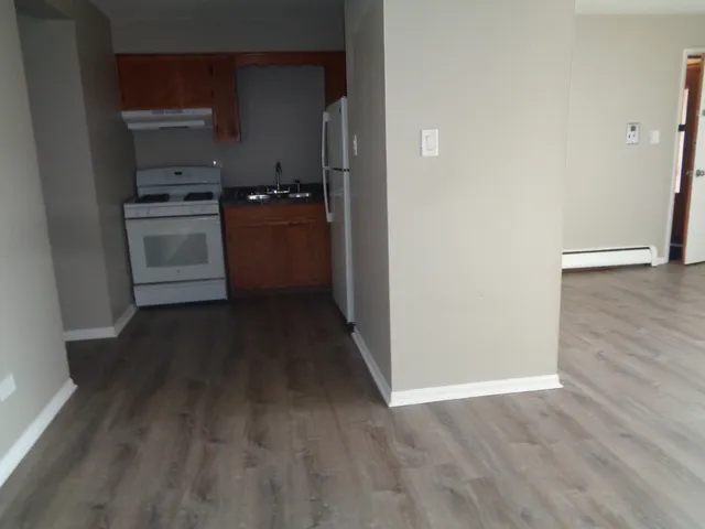 a storage room with wooden floor