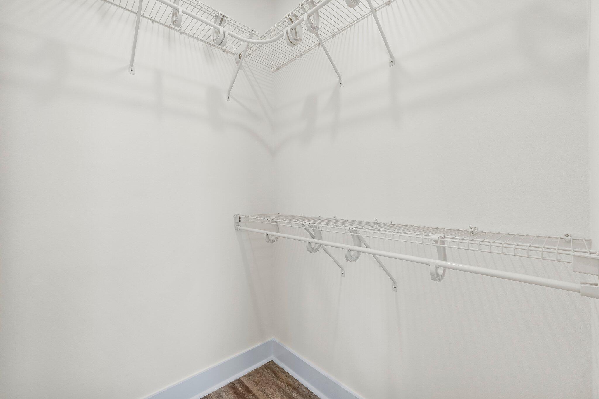 3958 West County Highway 30A, Unit 124 Santa Rosa Beach, FL 32459 - Photo 25 of 51 a view of a room with racks on the wall