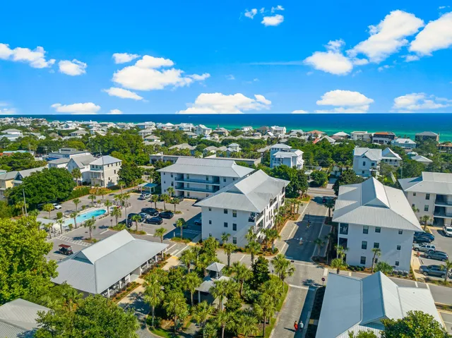 a view of a living room and kitchen