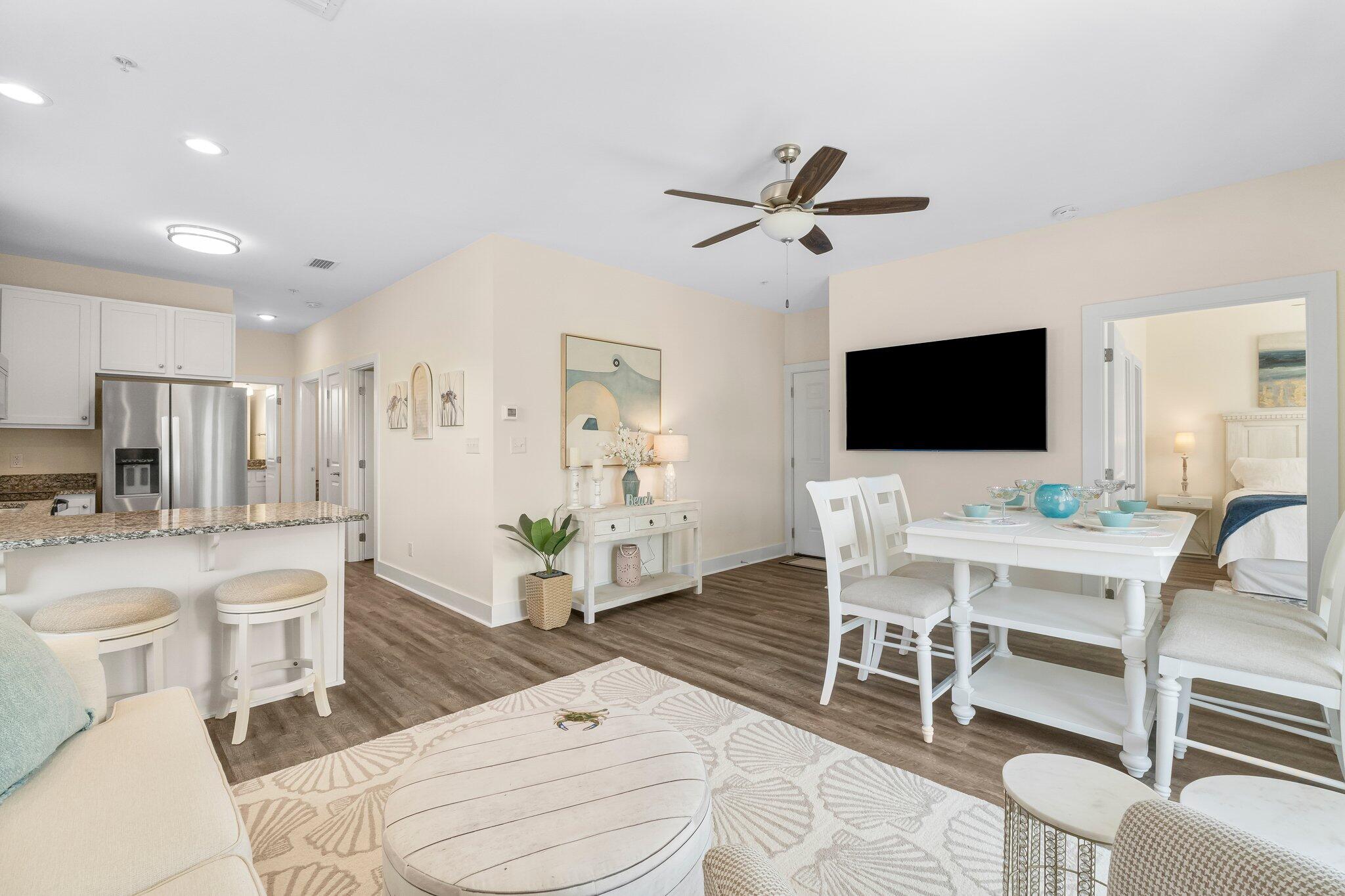 3958 West County Highway 30A, Unit 124 Santa Rosa Beach, FL 32459 - Photo 38 of 51 a living room with furniture and a flat screen tv