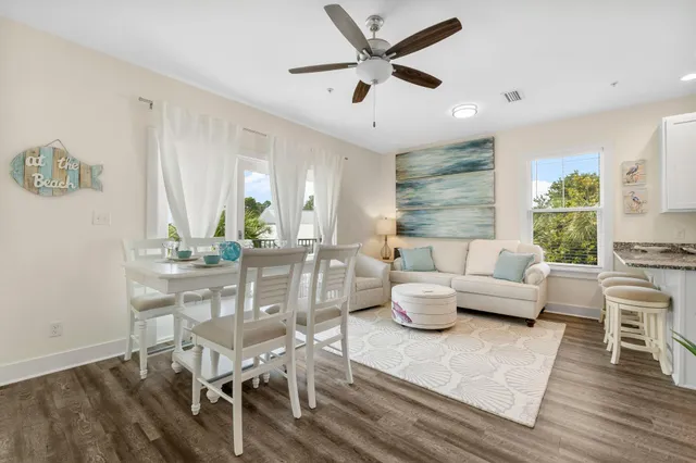 a front view of a house with a yard table and chairs