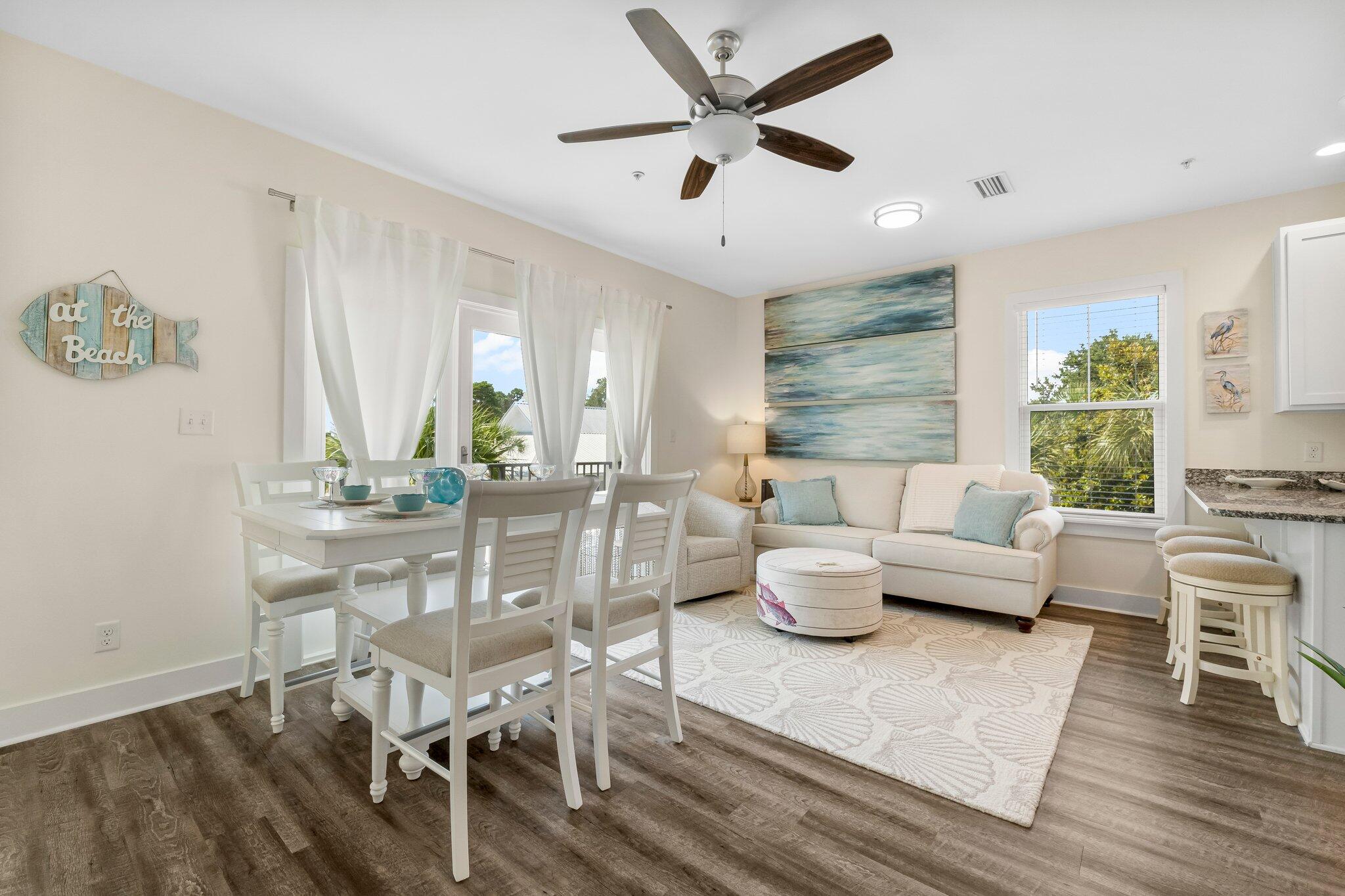 3958 West County Highway 30A, Unit 124 Santa Rosa Beach, FL 32459 - Photo 39 of 51 a living room with furniture and a large window