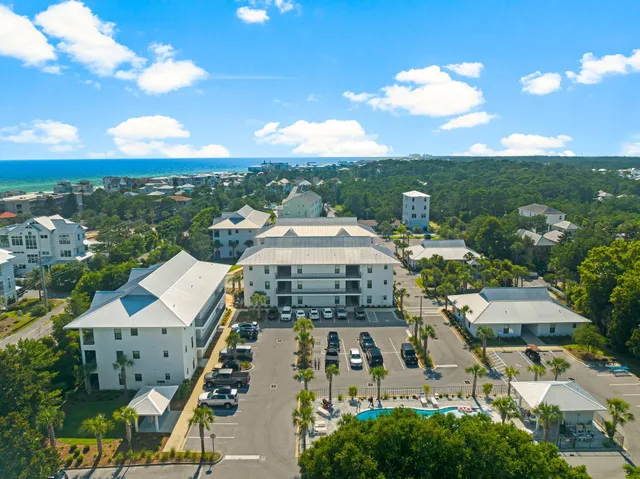 a backyard of a house with outdoor seating