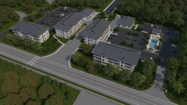 an aerial view of a house with a swimming pool