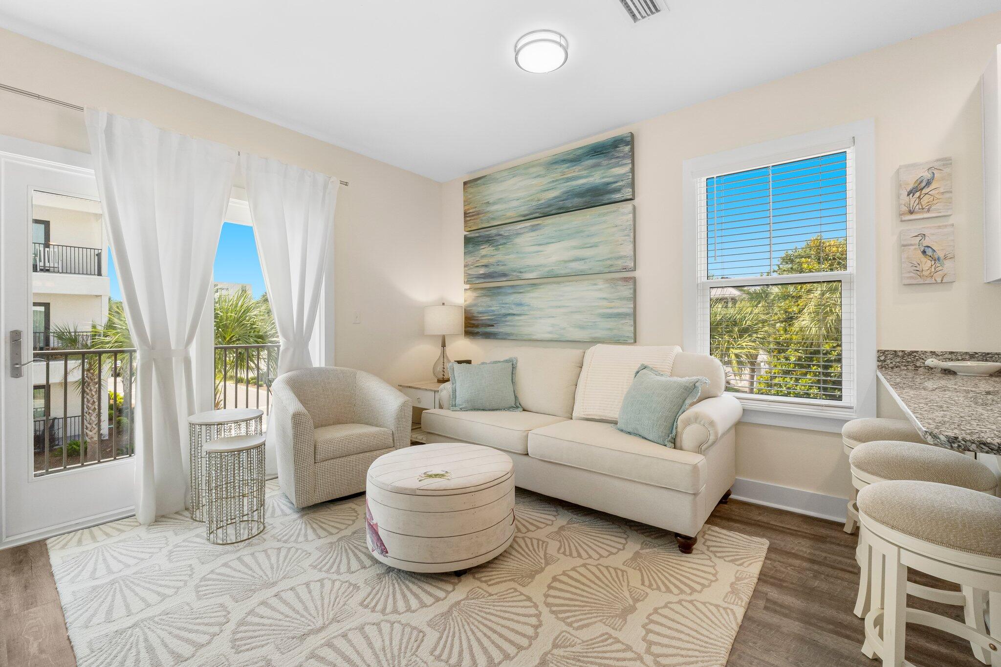 3958 West County Highway 30A, Unit 124 Santa Rosa Beach, FL 32459 - Photo 10 of 51 a living room with furniture and a large window