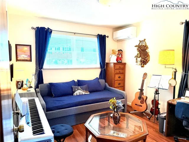 a bathroom with a tub and shower