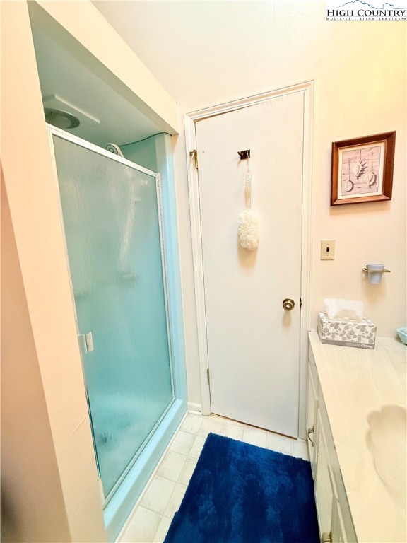 118 Pine Ridge Loop Newland, NC 28657 - Photo 25 of 50 a bathroom with a bathtub and a shower