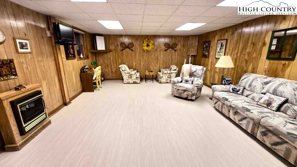 118 Pine Ridge Loop Newland, NC 28657 - Photo 30 of 50 a bedroom with furniture and a flat screen tv