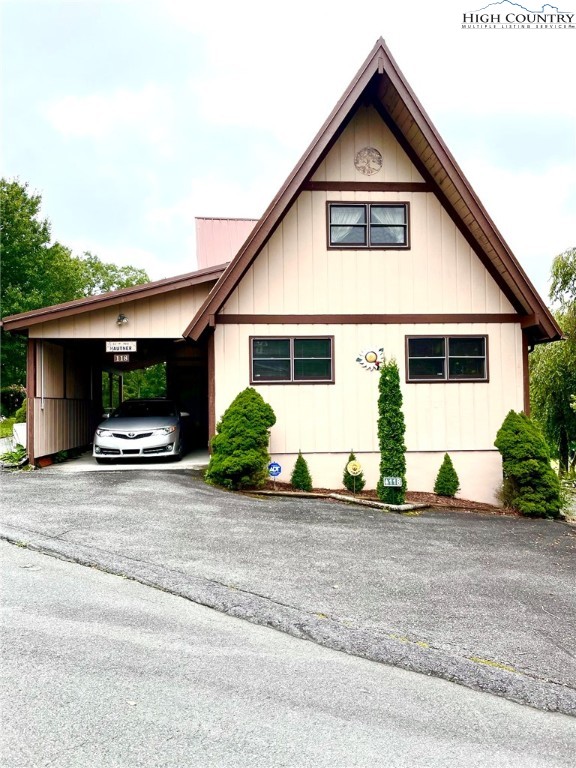 118 Pine Ridge Loop Newland, NC 28657 - Photo 45 of 50 a view of a house with a yard and garage