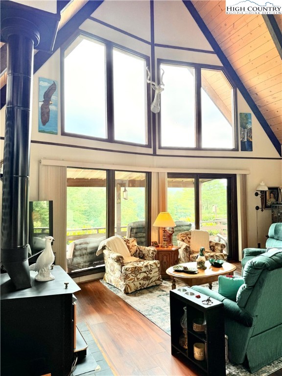 118 Pine Ridge Loop Newland, NC 28657 - Photo 5 of 50 a living room with furniture and floor to ceiling windows