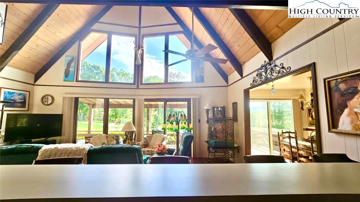 118 Pine Ridge Loop Newland, NC 28657 - Photo 9 of 50 a living room with furniture and a flat screen tv