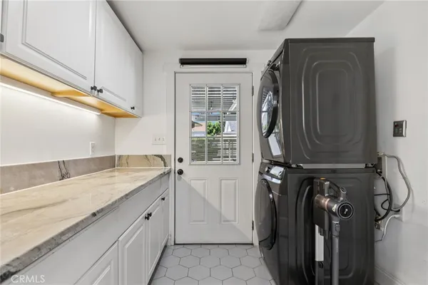 a utility room with cabinets