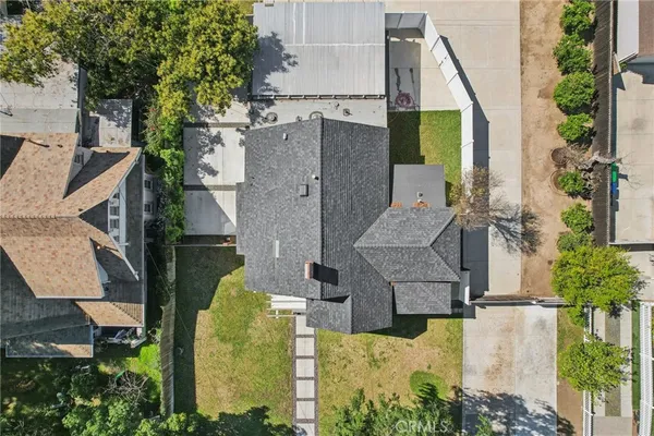 an aerial view of a house with outdoor space