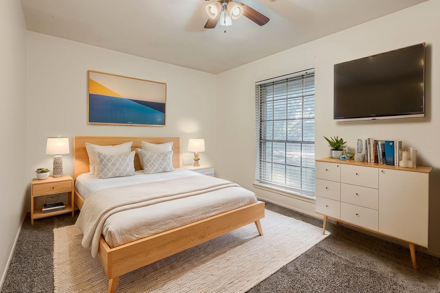 1411 Neptune Lane Houston, TX 77062 - Photo 18 of 22 a bedroom with a bed and a flat screen tv