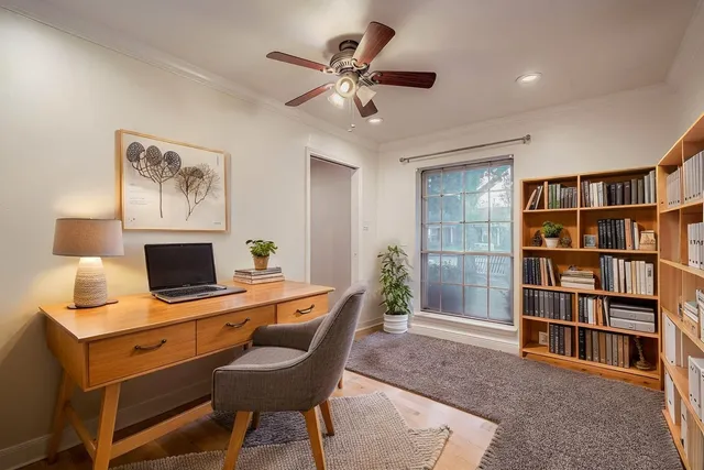 a view of a workspace with furniture