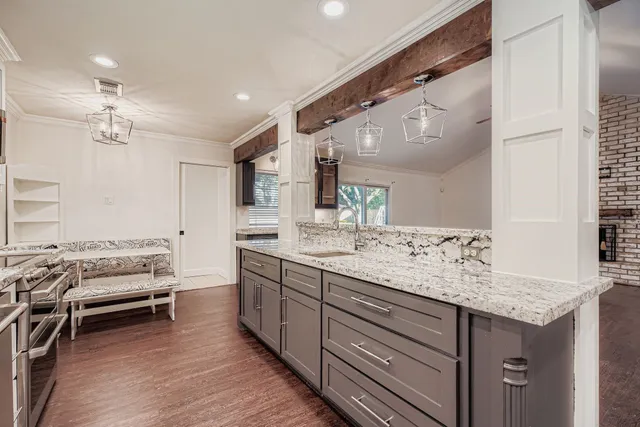 a bathroom with a sink double vanity and shower