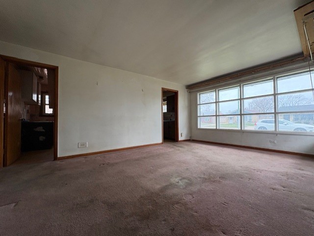 7715 South Kilpatrick Avenue Chicago, IL 60652 - Photo 2 of 12 a view of an empty room with a window