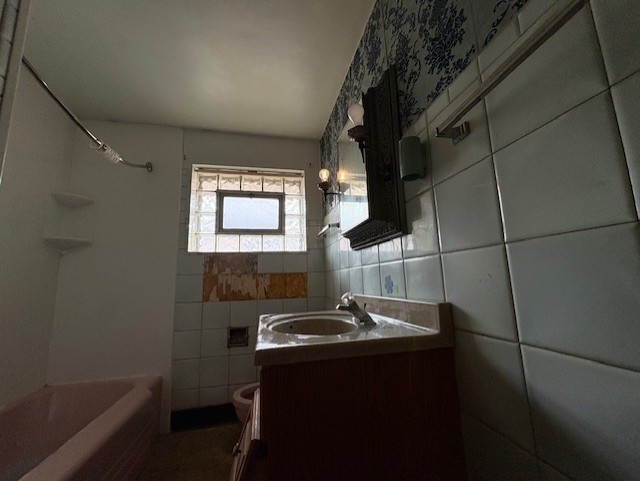 7715 South Kilpatrick Avenue Chicago, IL 60652 - Photo 7 of 12 a bathroom with a sink and a mirror